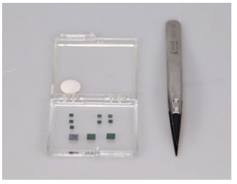 MEMS can be safely handled with metal tweezers with plastic tips and stored in a gelpack